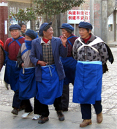 Naxi ladies strolling home after work can be seen on The California Native China Tours